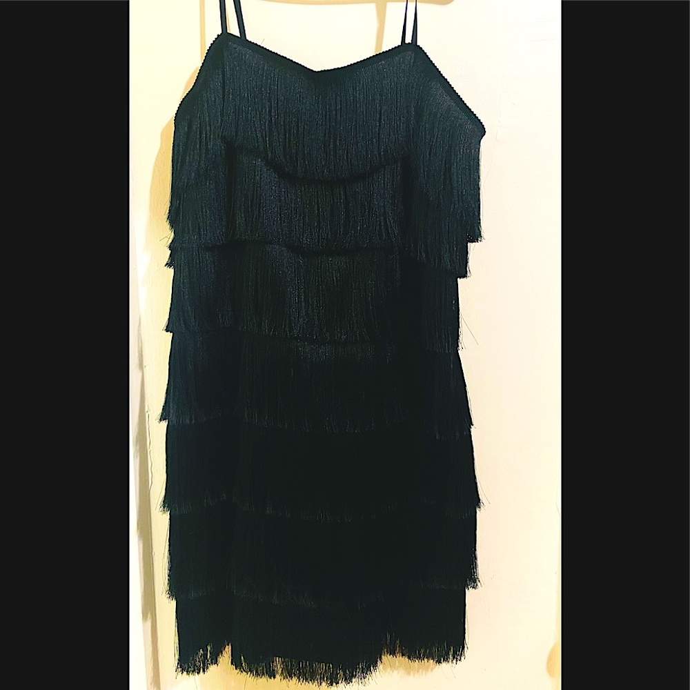 If you have a few pounds more and you want to hide them this dress is perfect